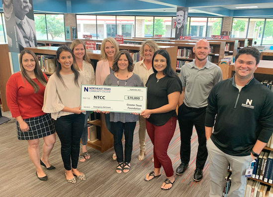 group receiving grant check