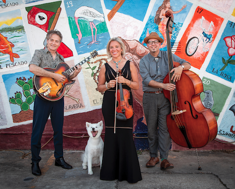 hot club of cowtown group photo in front of mural with cute dog