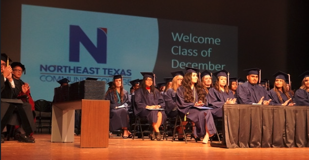 grads on stage