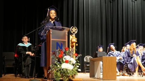 Courtney Baldwin speaking at graduation