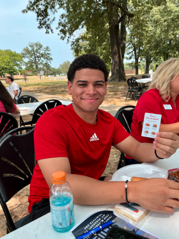 student enjoying his lunch