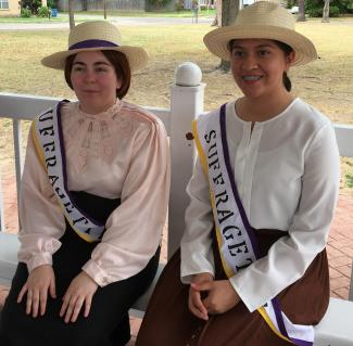 Skylar Hodson, and Neida Perez as Texas Suffragettes