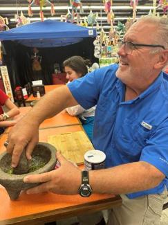 guy making salsa