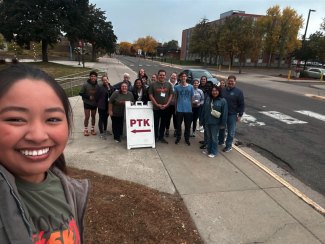 monse with PTK members in background