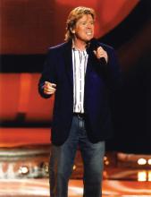 Peter Noone singing