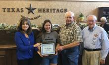 mercedes collins receiving award