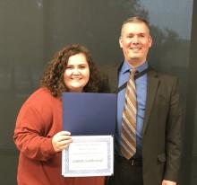 Lauren Southerland pictured with Professor John Russo