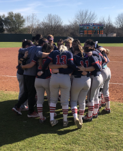 softball girls in huddle at Hill College