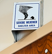 shelter area sign above door