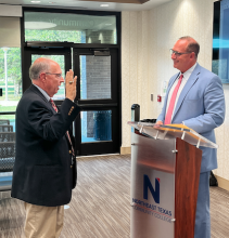 wootten being sworn in by Cooper