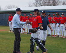 clinton with baseball team